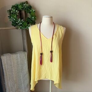 Melissa Paige sheer handkerchief sleeveless top